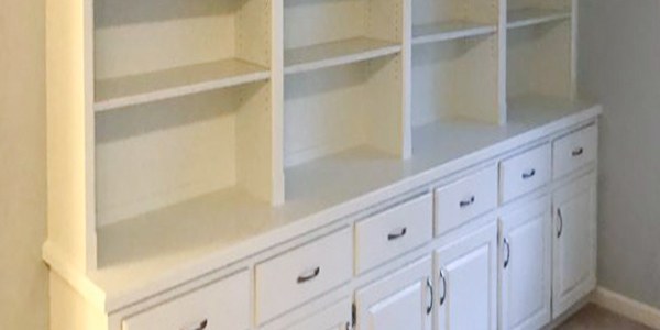 White built-in bookshelf cabinets painted by Castle Complements